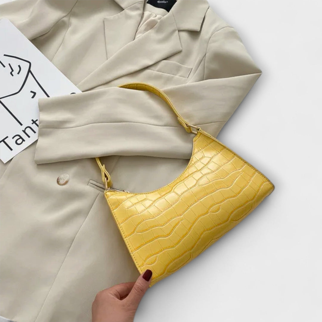 Olivia - Glänzende Veganlederhandtasche