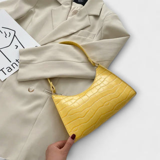 Olivia - Glänzende Veganlederhandtasche