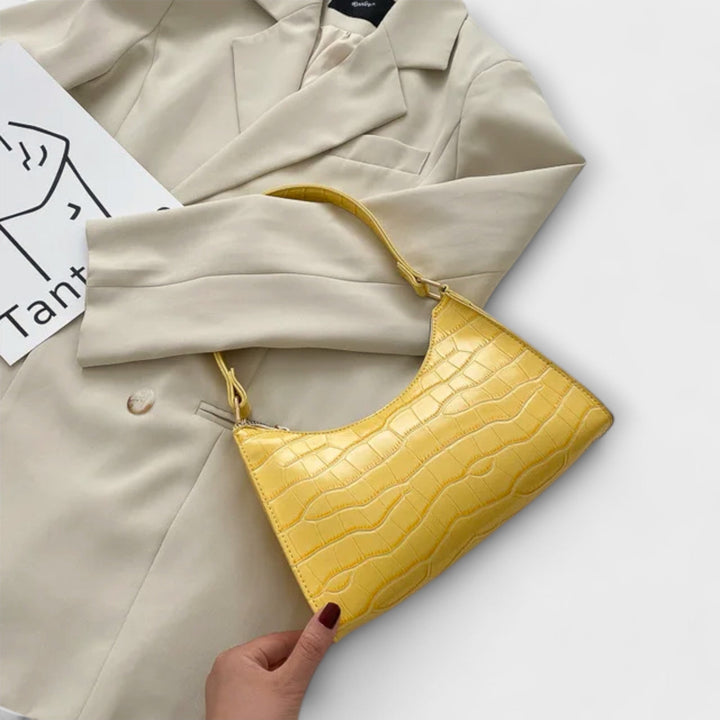 Olivia - Glänzende Veganlederhandtasche