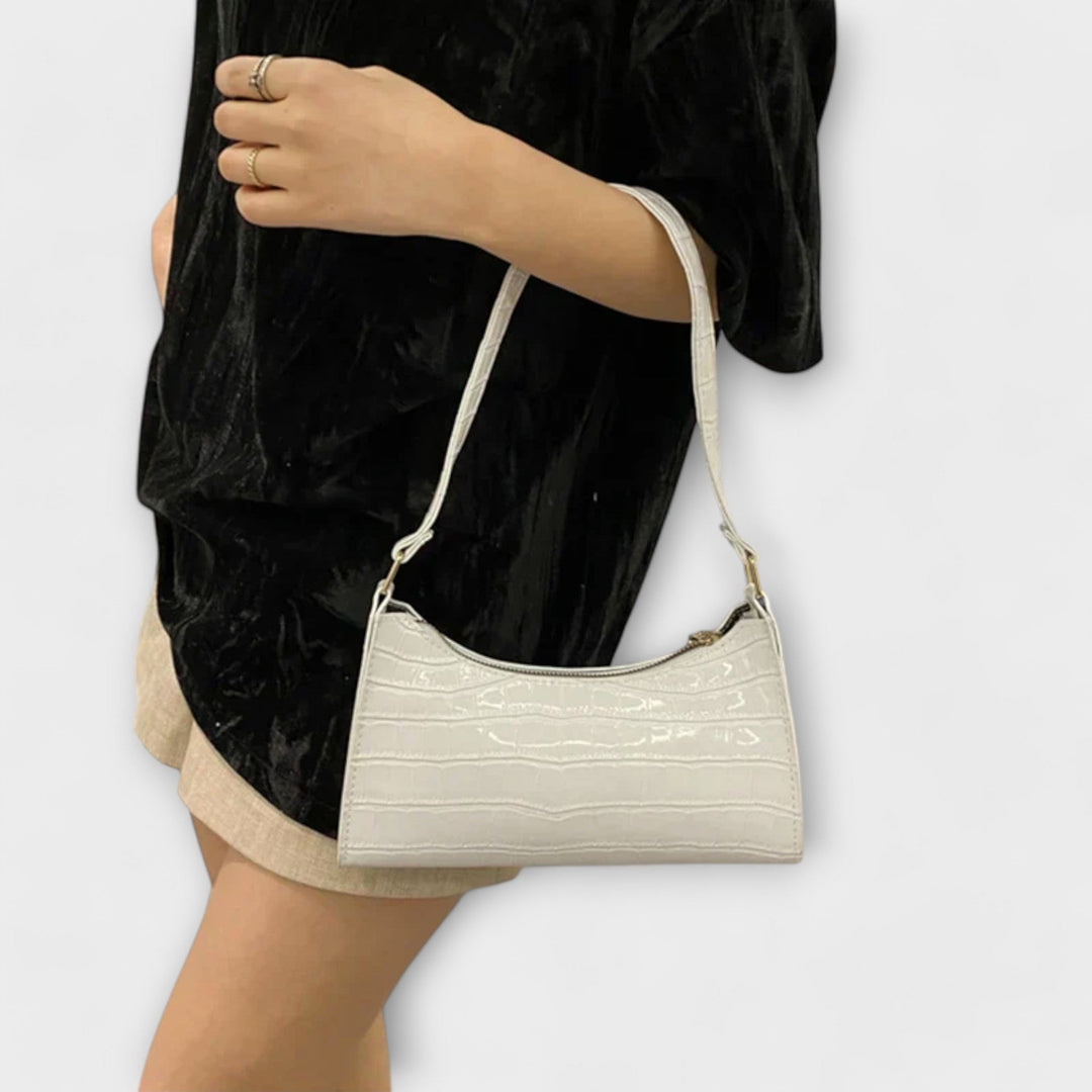 Olivia - Glänzende Veganlederhandtasche