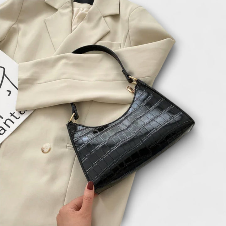 Olivia - Glänzende Veganlederhandtasche
